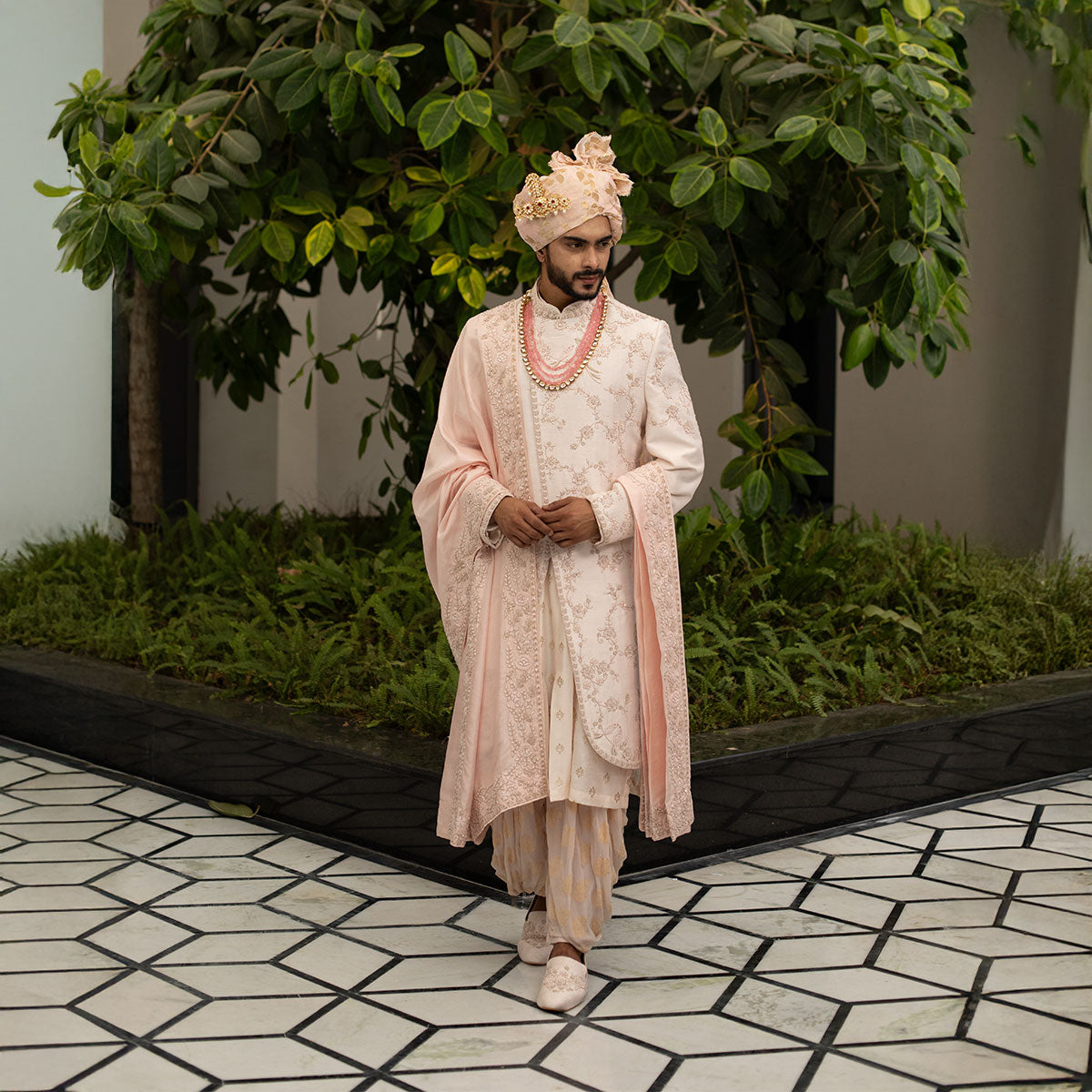 Sherwani set with intricate hand embroidery